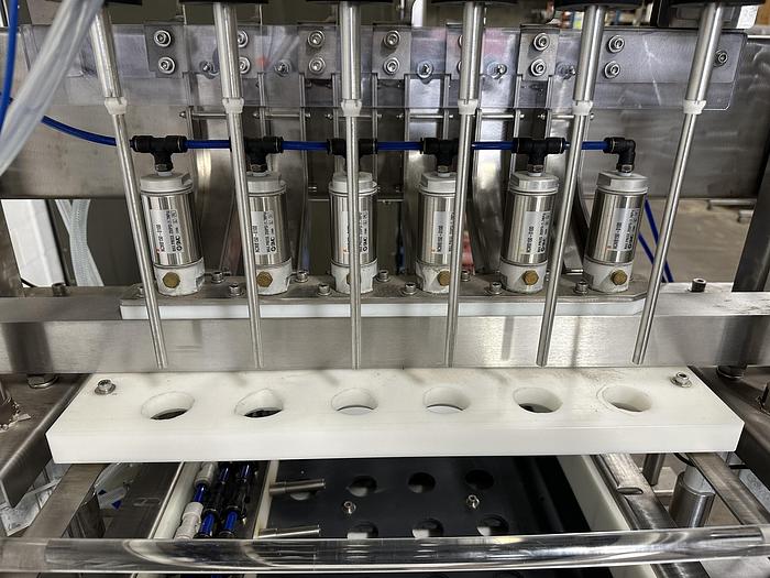 Used CBK 6 Head Bottle Filler