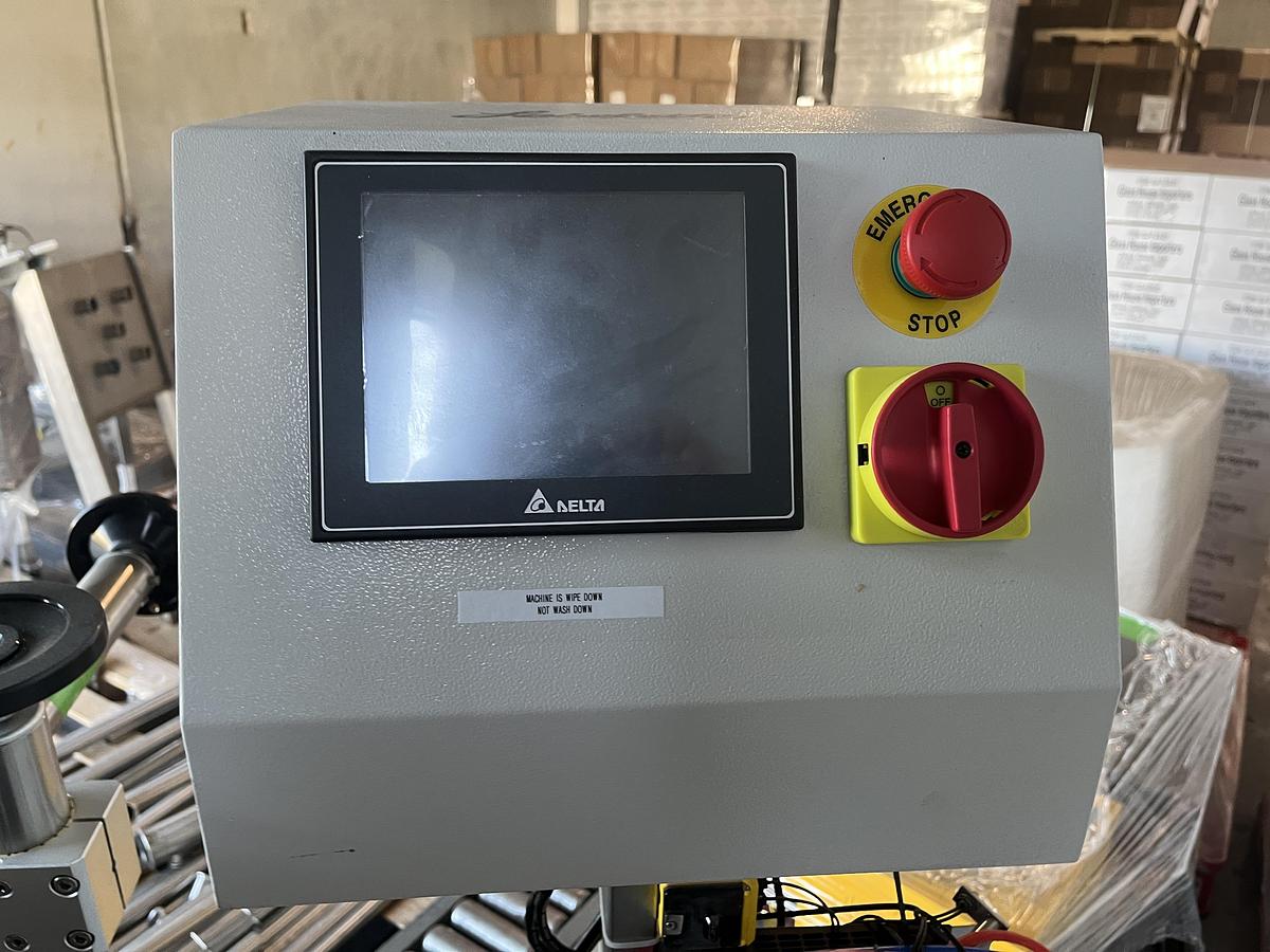 Used Accutek Tamper Evident Neck Bander Applicator