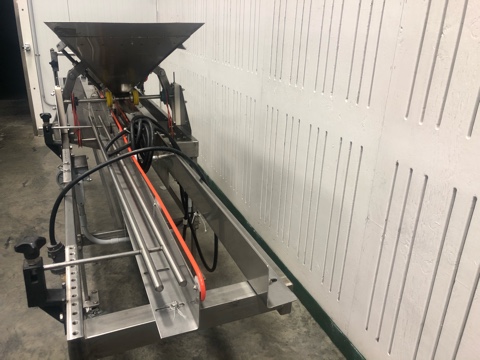 Used Lakewood CS1 Volumetric Clamshell Filler