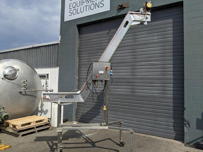 Used FMA 12' High Incline Indexing Conveyor