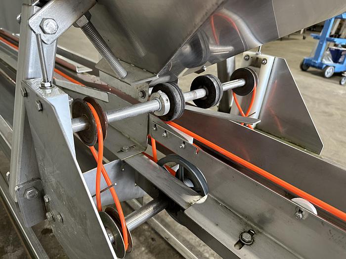 Used A&B Volumetric Clamshell Filler