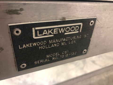 Used Lakewood CS1 Volumetric Clamshell Filler