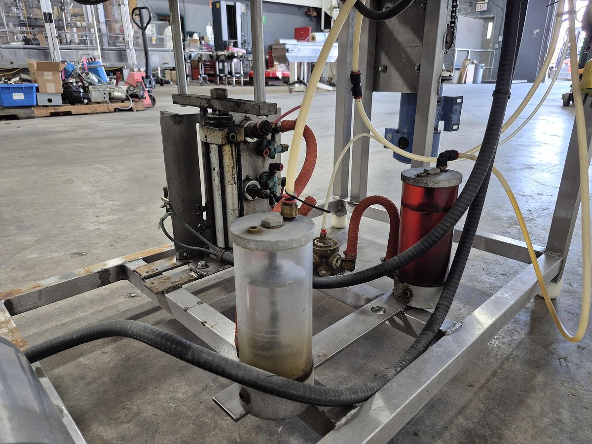 Used All-Fill Automatic Inline Single-Head Bottle Filler with Conveyor