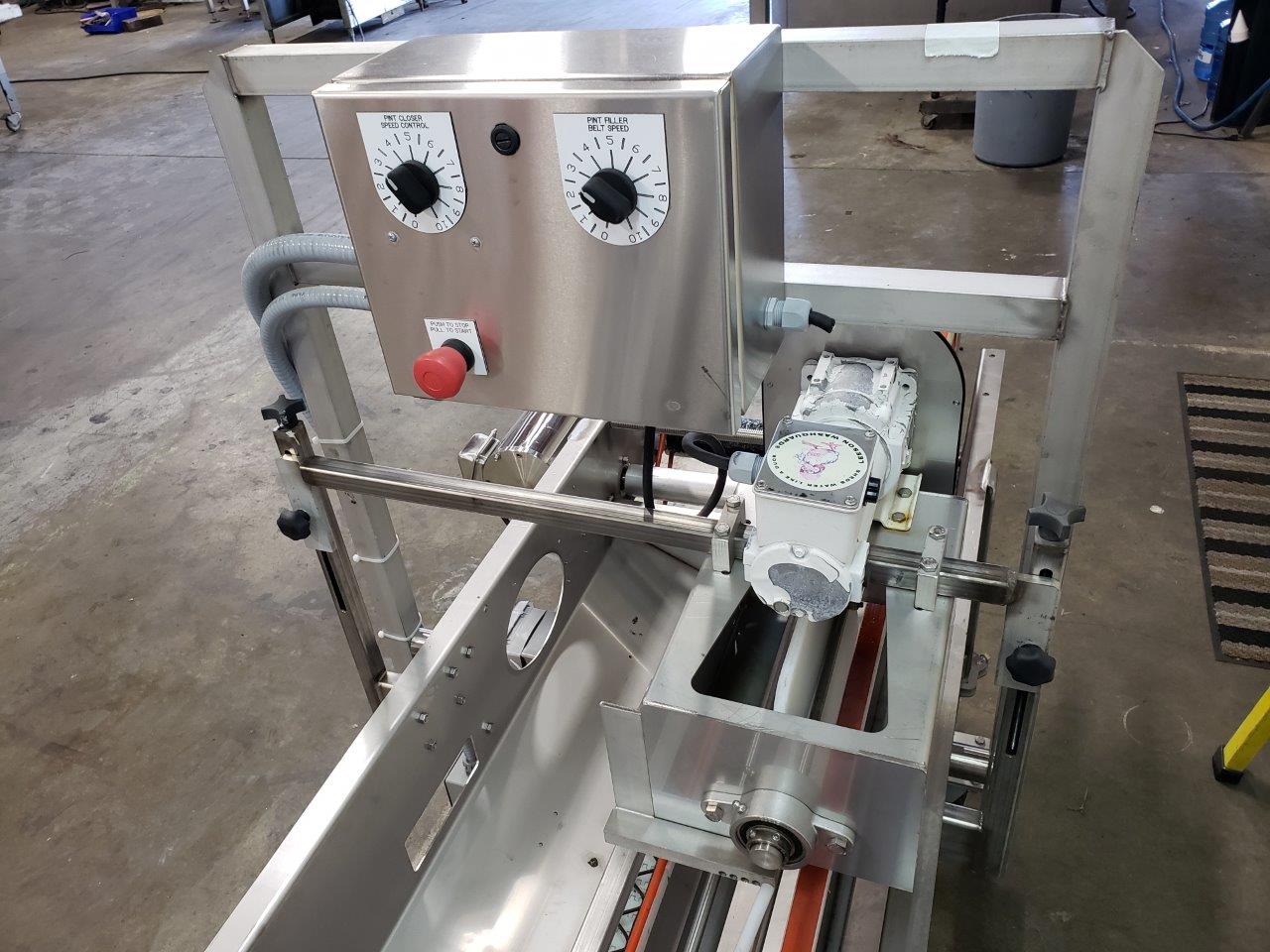 Used Lakewood Volumetric Clamshell Filler