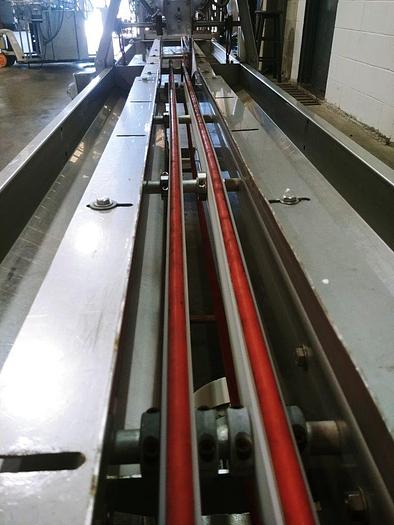 Used A&B Volumetric Clamshell Filler