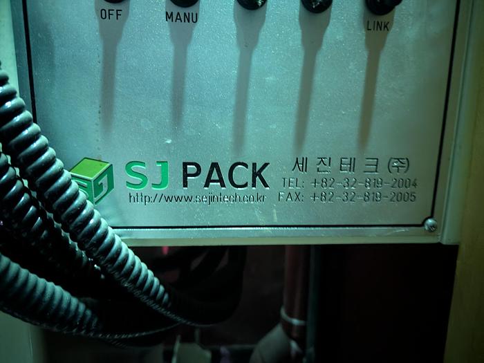 Used Two-Head Vibratory Filler with Elevator