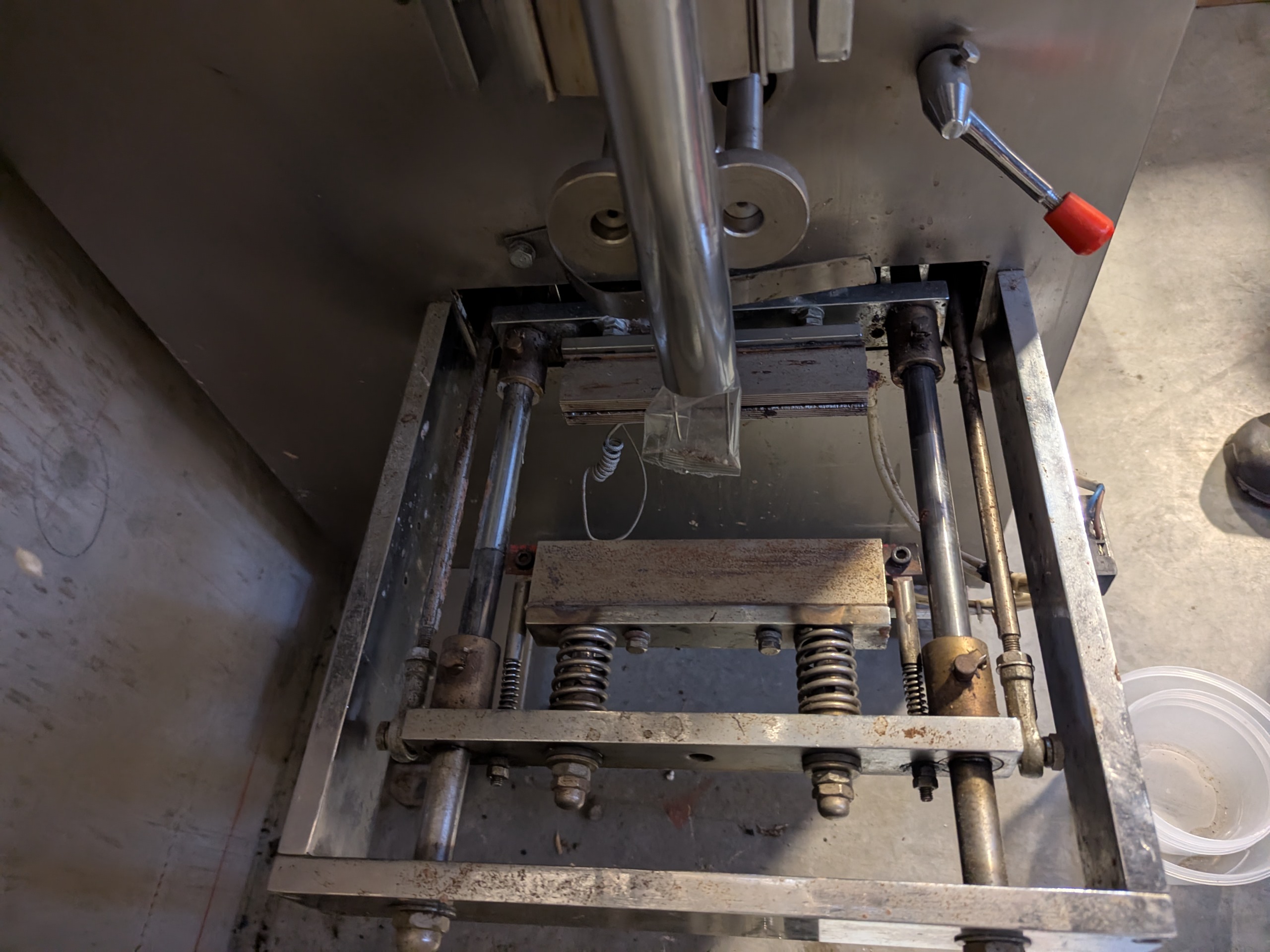 Used Flow Packer with Bucket Infeed