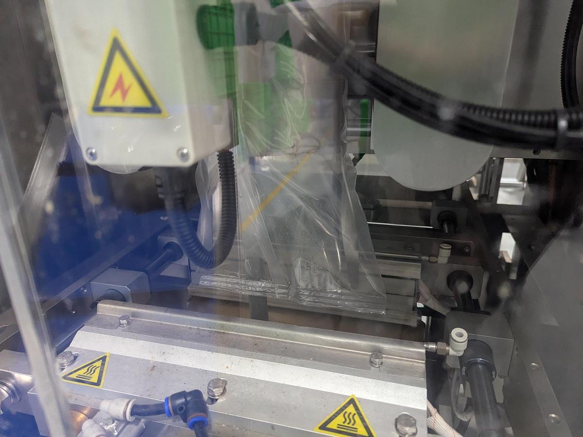 Used 10-Head Scale Bagger System with Infeed Conveyor 