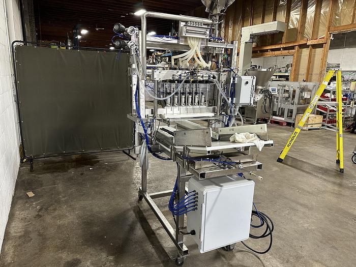 Used CBK 6 Head Bottle Filler