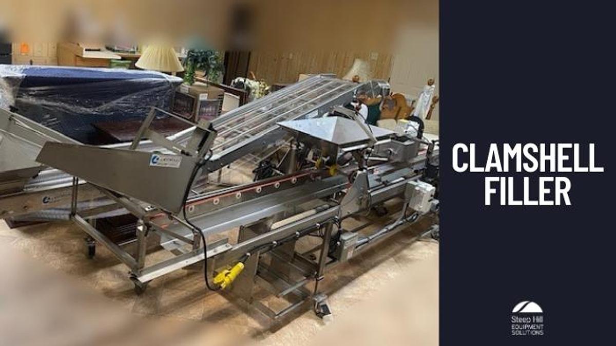 Used Lakewood Clamshell Filler with Infeed Conveyor & Accumulation Table