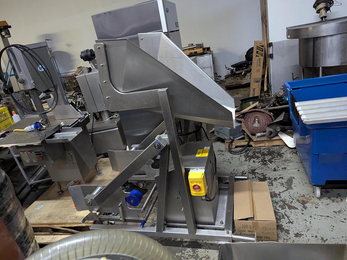 Used Henneken Vacuum Tumbler with Buggy Dumper