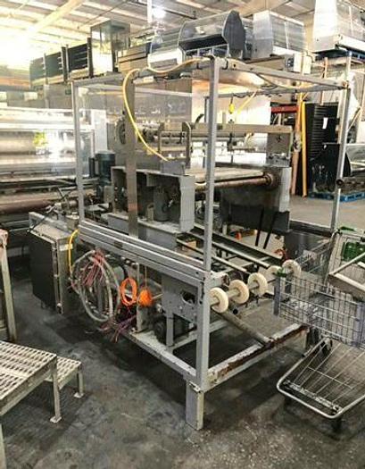 Used Adamatic NDR Roll Make-Up Line