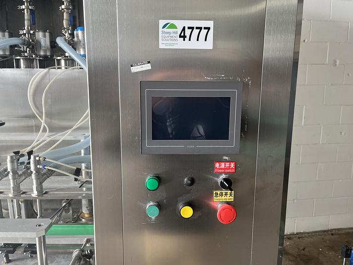 Used 6-Head Bottle Filler