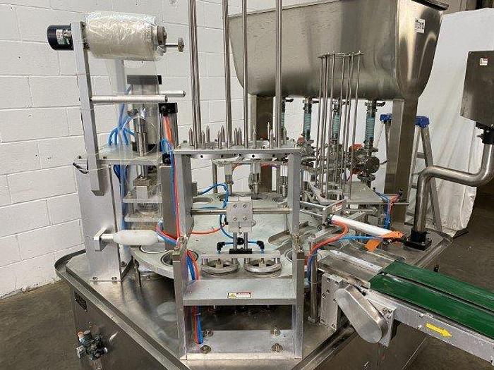 Used Bespacker XBG900-2 Rotary Cup Fill & Seal