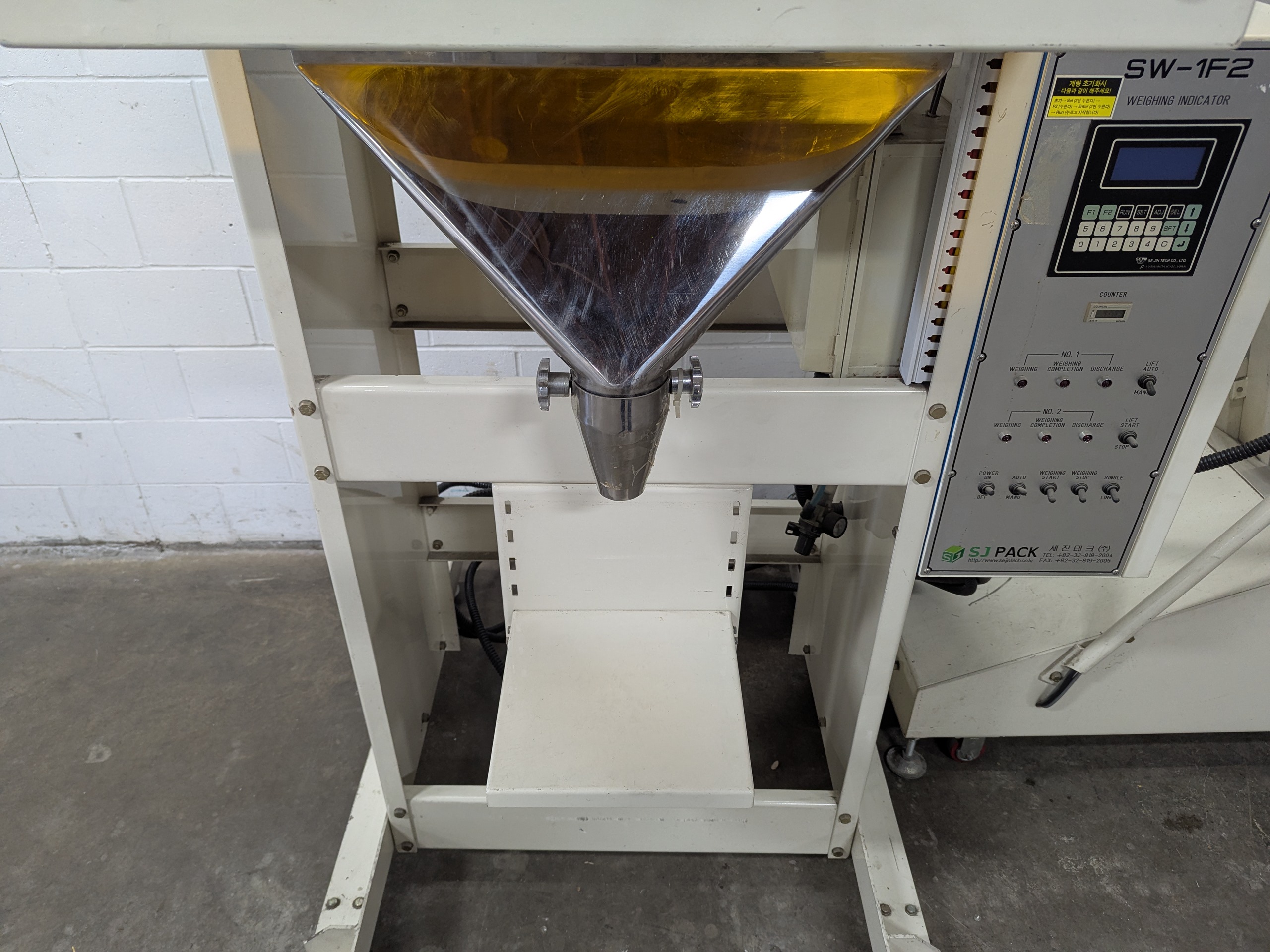 Used Dual Head Net Weigh Filler with Bucket Elevator Infeed