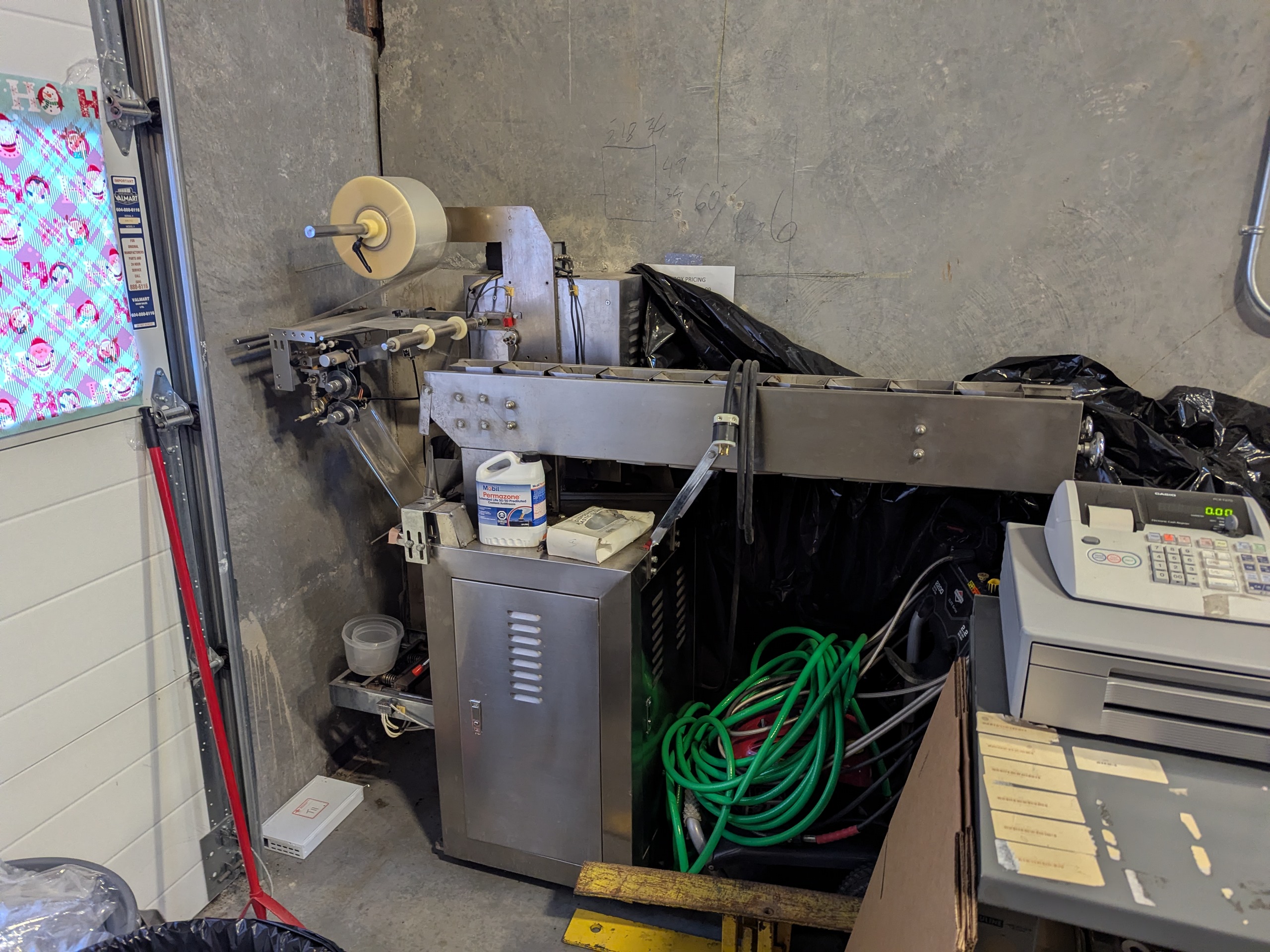 Used Flow Packer with Bucket Infeed