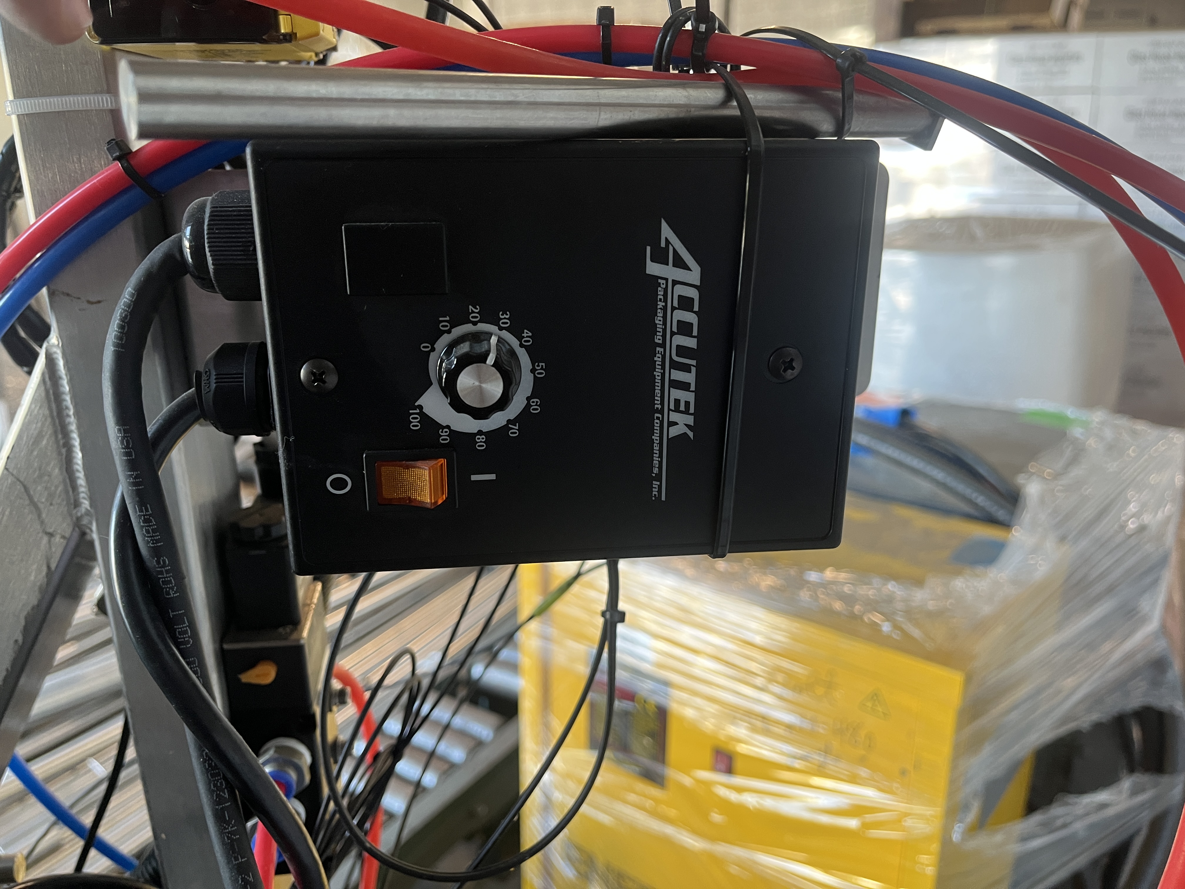 Used Accutek Tamper Evident Neck Bander Applicator