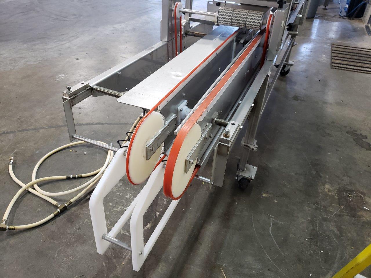 Used Lakewood Volumetric Clamshell Filler