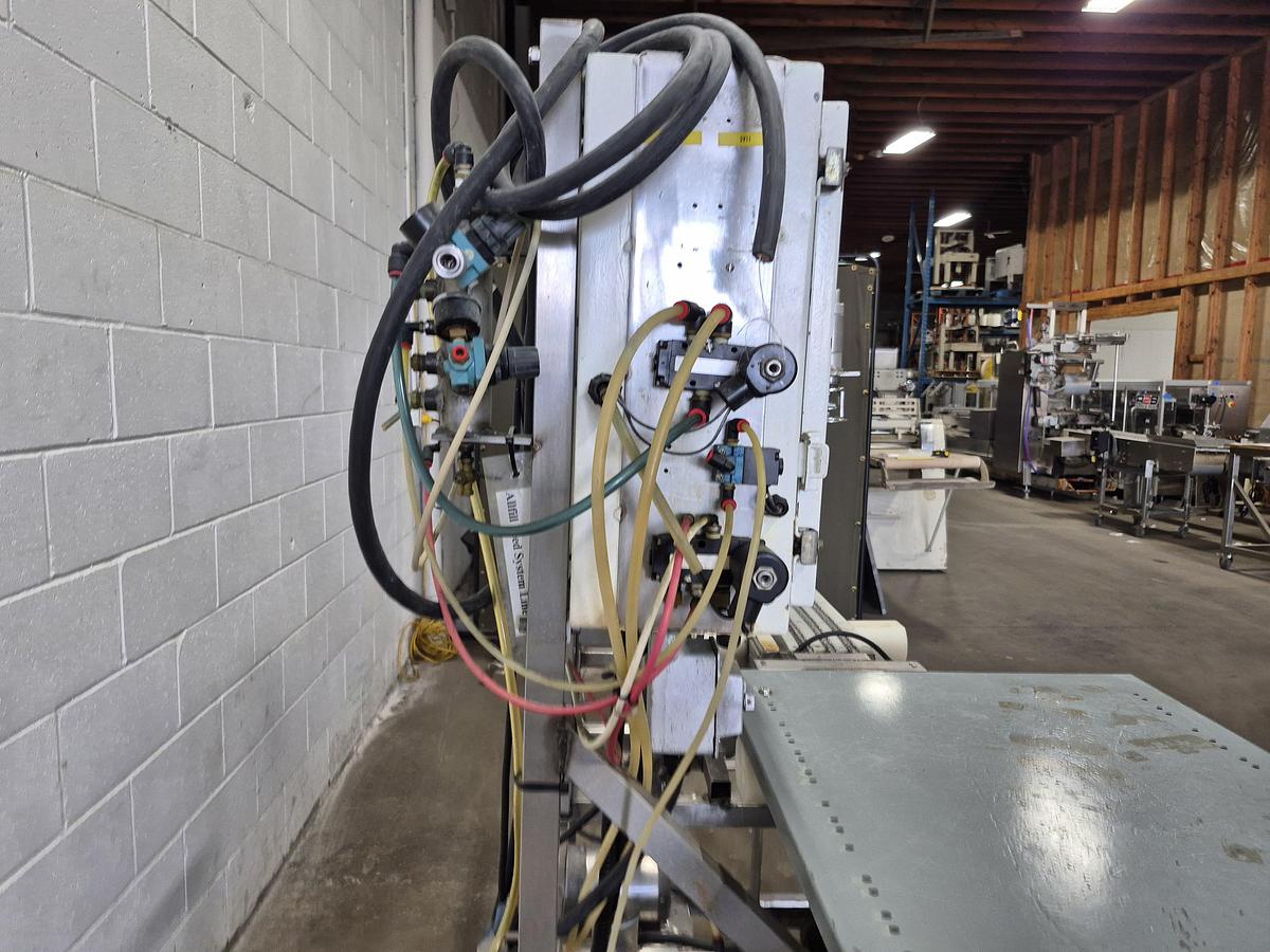 Used All-Fill Automatic Inline Single-Head Bottle Filler with Conveyor