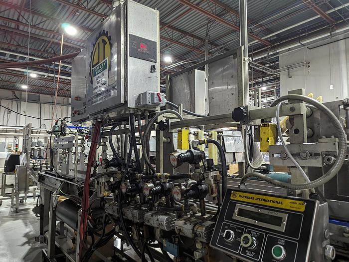 Used Harness Model 825 Drop Case Packer