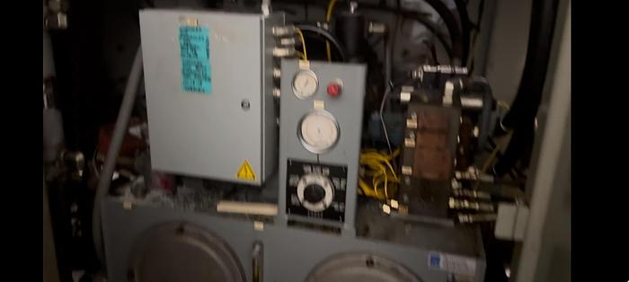 Used UNILOY R2000 BLOWMOLDER WITH 10041 TRIMMER AND COOLING BED 