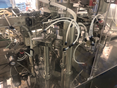 Used Actionpac Rotary Poucher with Scales