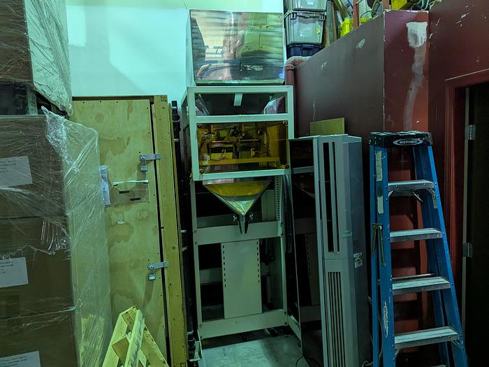 Used Two-Head Vibratory Filler with Elevator