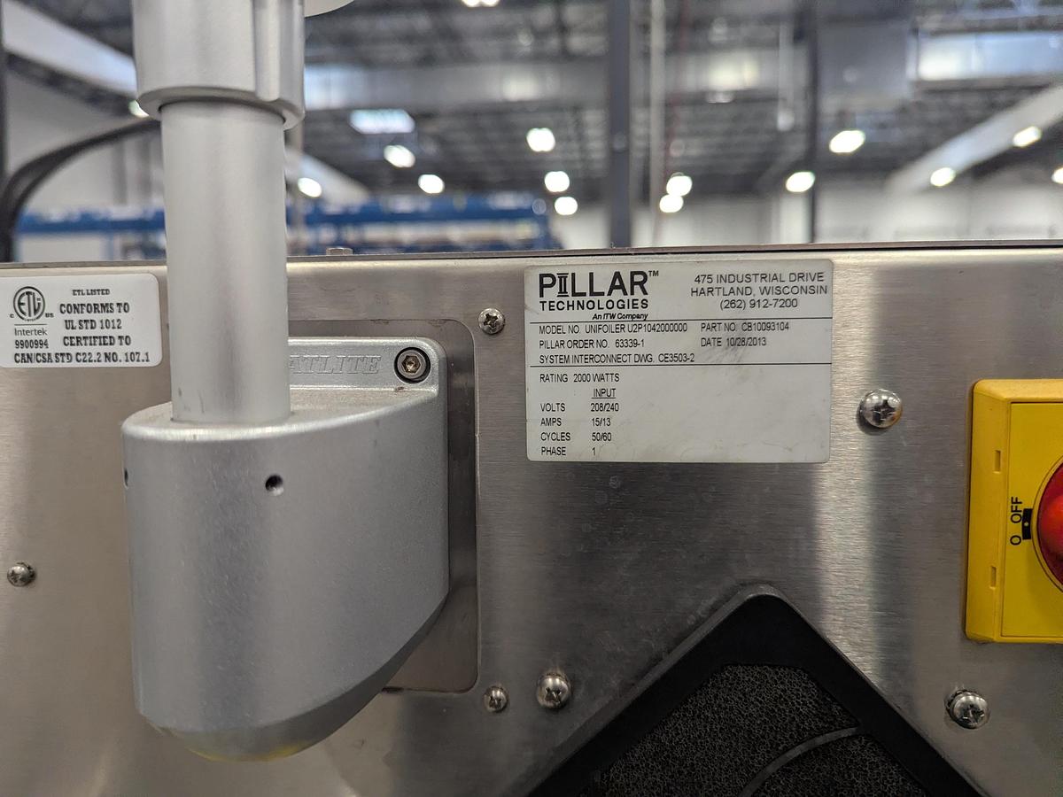 Used Aesus 6-Head Filling Line with Descrambler. Labeler, Filler, Capper, Induction Sealer & Accumulation Table