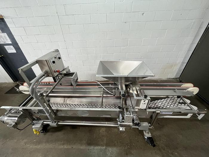 Used Lakewood 31025 Volumetric Clamshell Filler