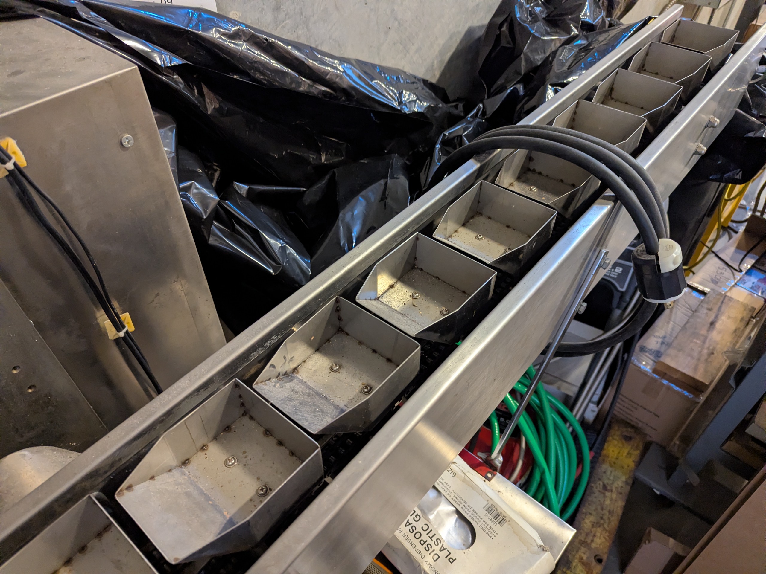 Used Flow Packer with Bucket Infeed