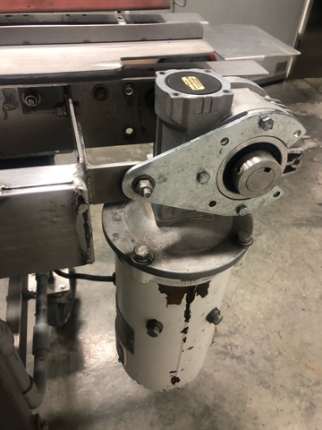 Used Lakewood CS1 Volumetric Clamshell Filler