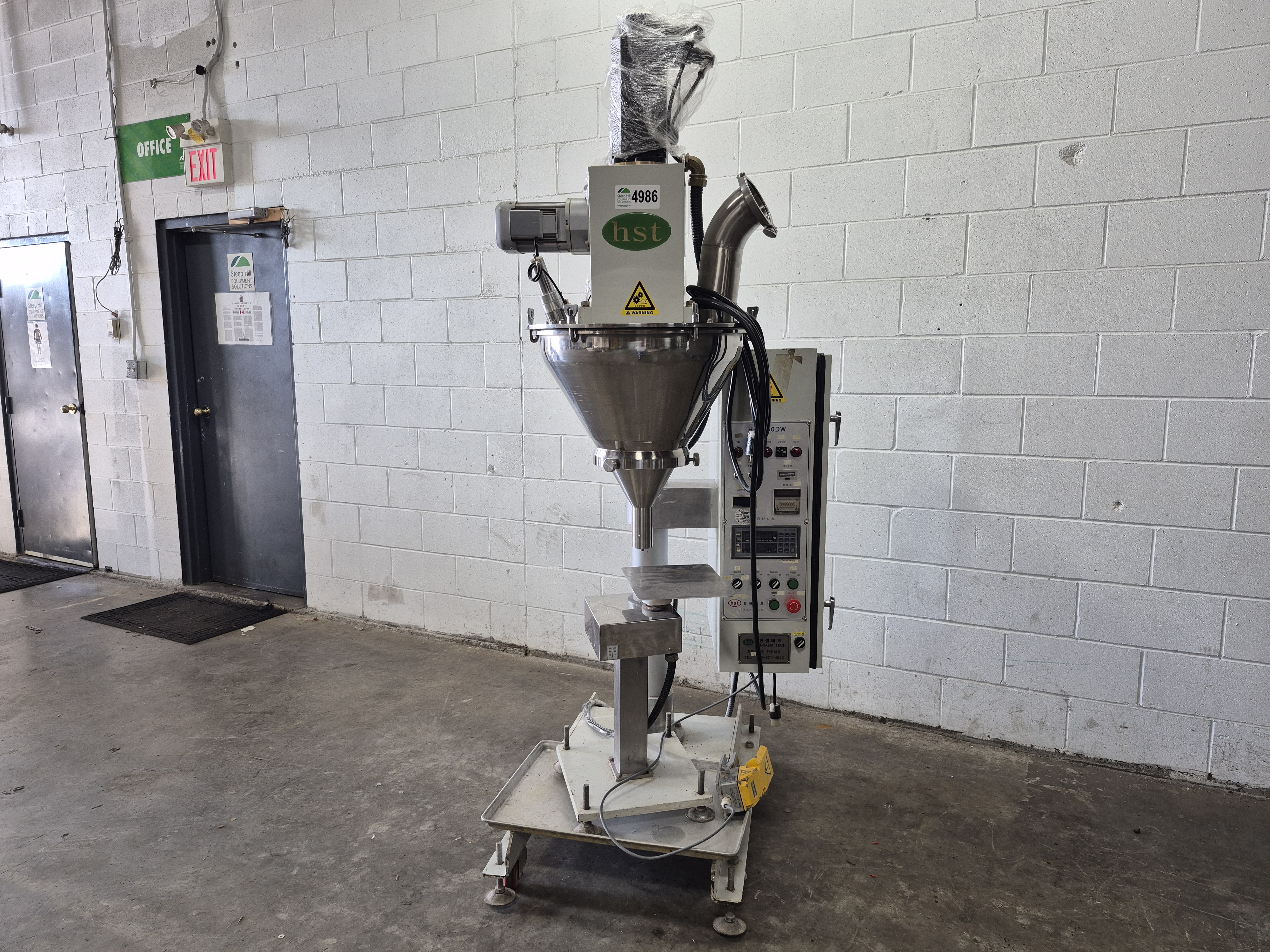 Used Hansaem HA-980 DW Powder Filler