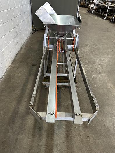 Used A&B Volumetric Clamshell Filler