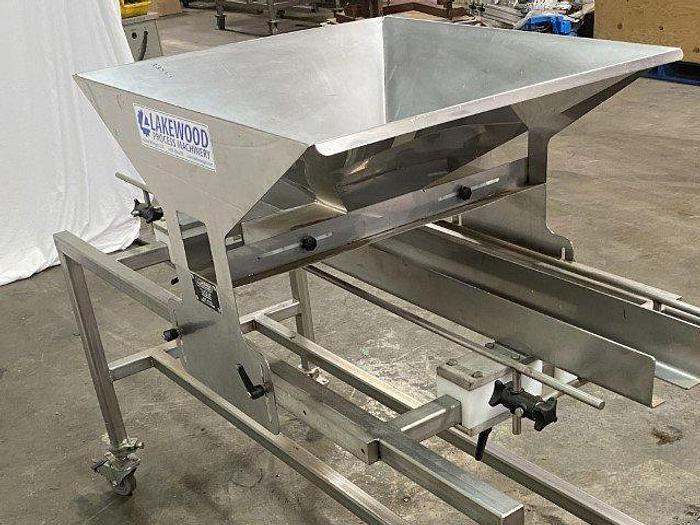 Used Lakewood Manual Clamshell Filler