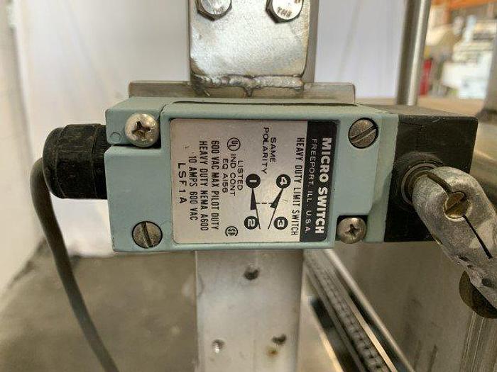 Used Pneumatic Press on Chain Conveyor