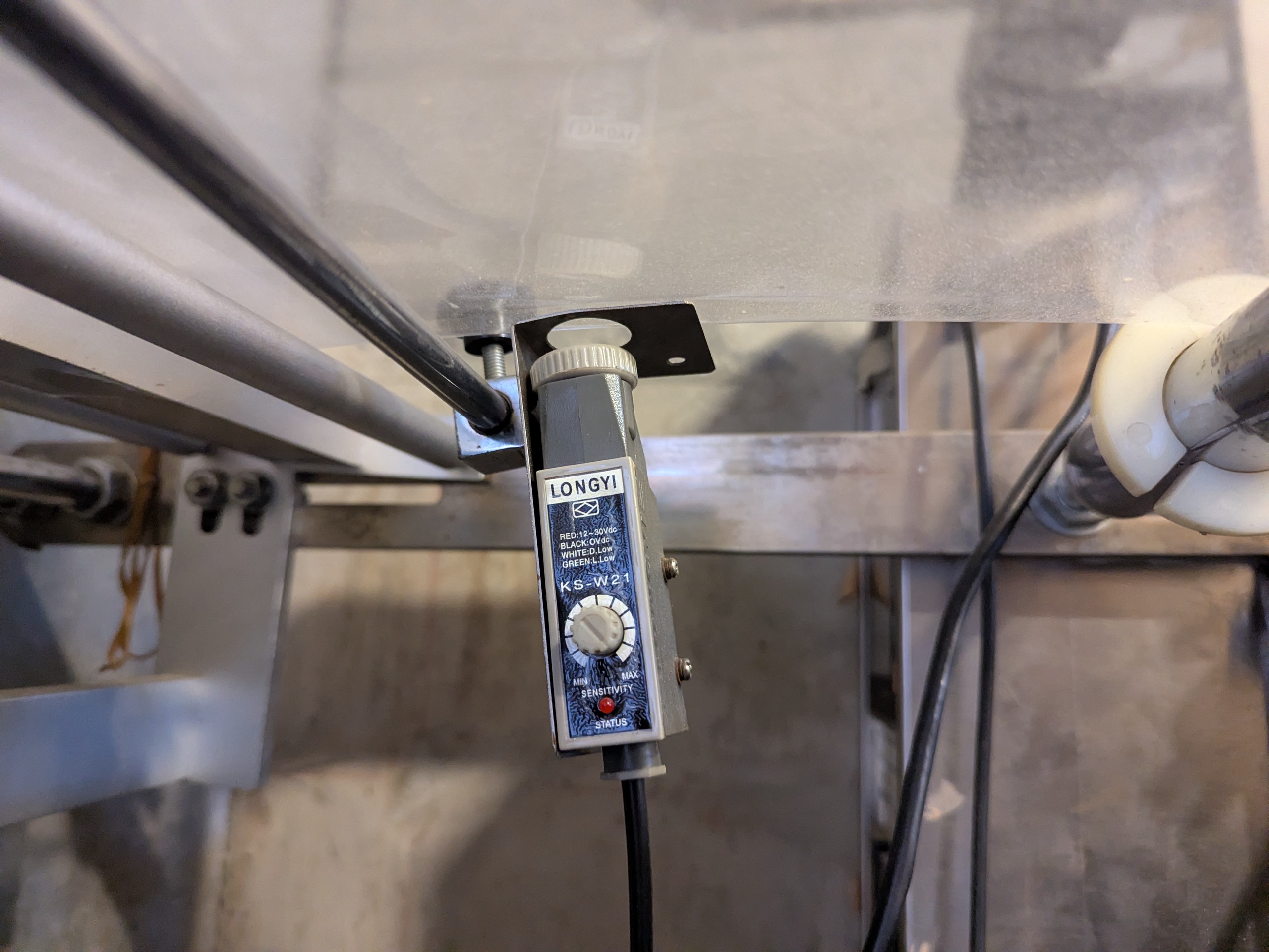 Used Flow Packer with Bucket Infeed