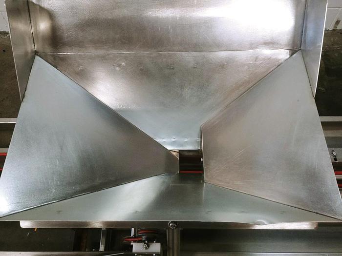 Used A&B Volumetric Clamshell Filler