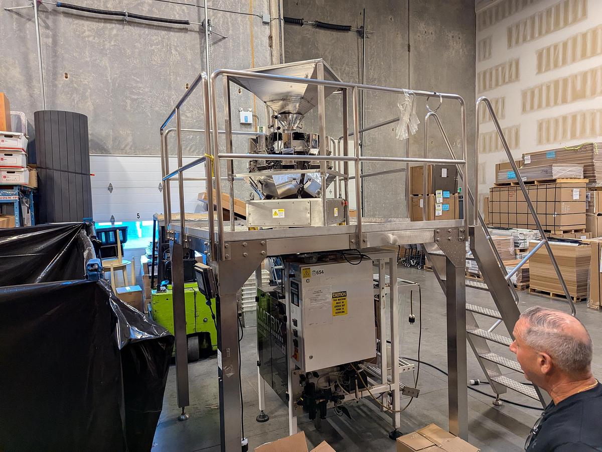 Used Matrix 916R Bagger with Platform and 10 Head Scale