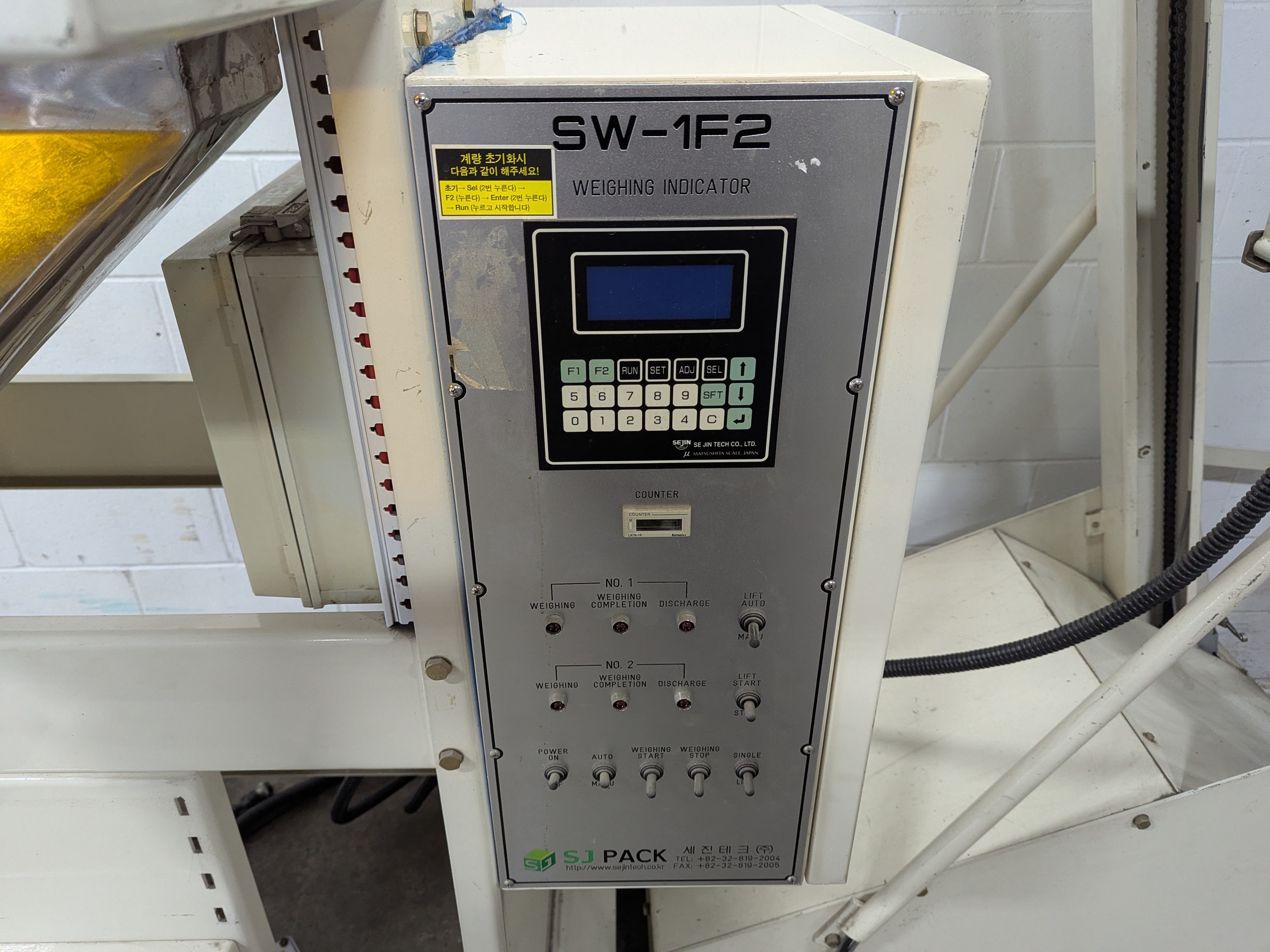 Used Dual Head Net Weigh Filler with Bucket Elevator Infeed