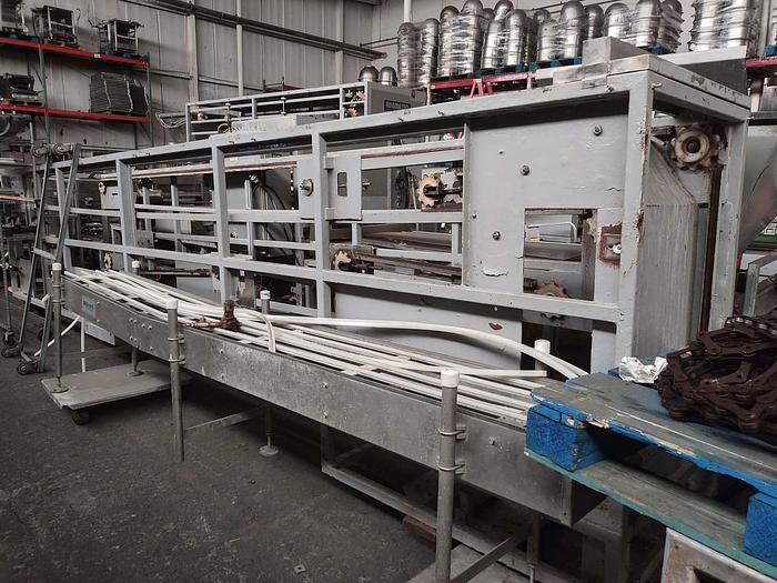 Used Adamatic NDR Roll Make-Up Line