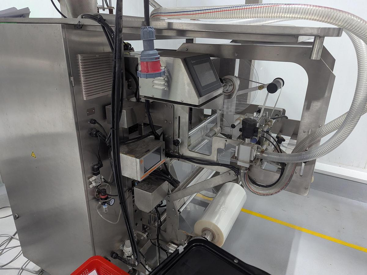 Used 10-Head Scale Bagger System with Infeed Conveyor 