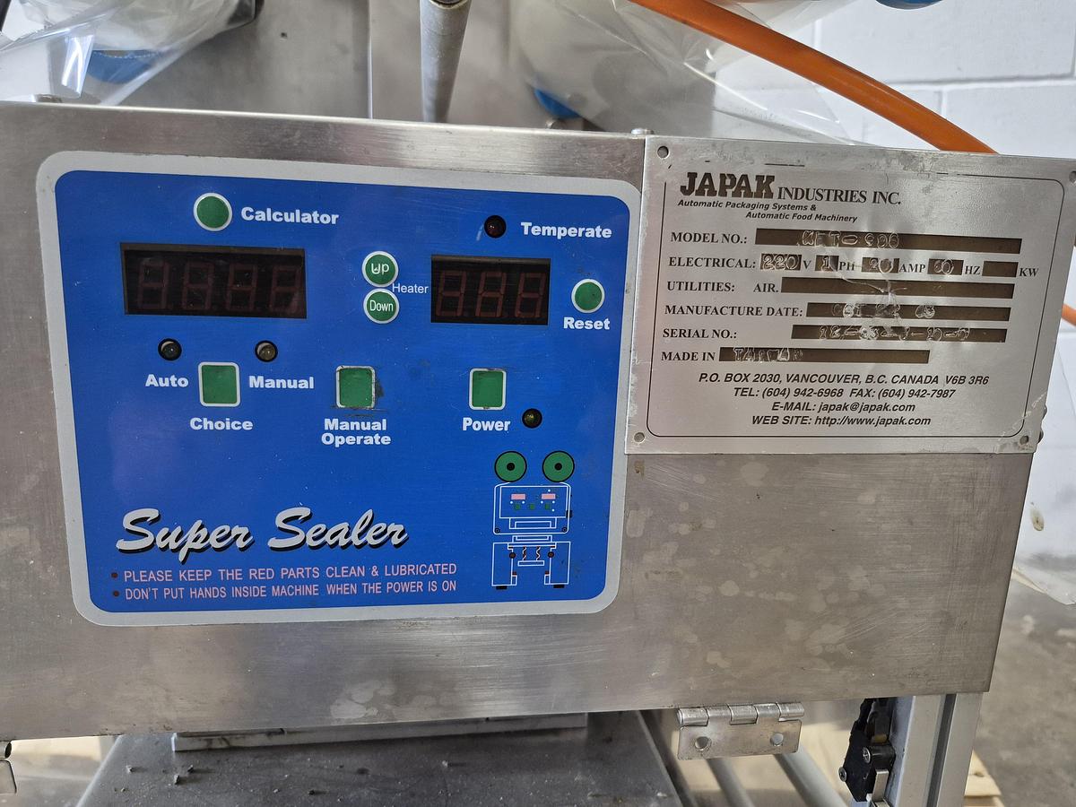Used Japak KE TO-900 Automatic Cup & Tray Sealer