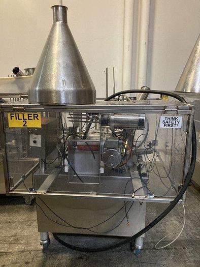 Used World Cup Rotary Filler