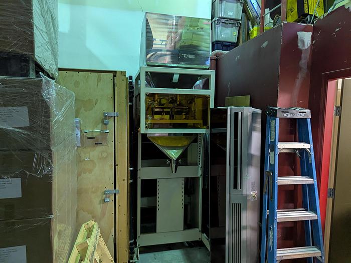 Used Two-Head Vibratory Filler with Elevator