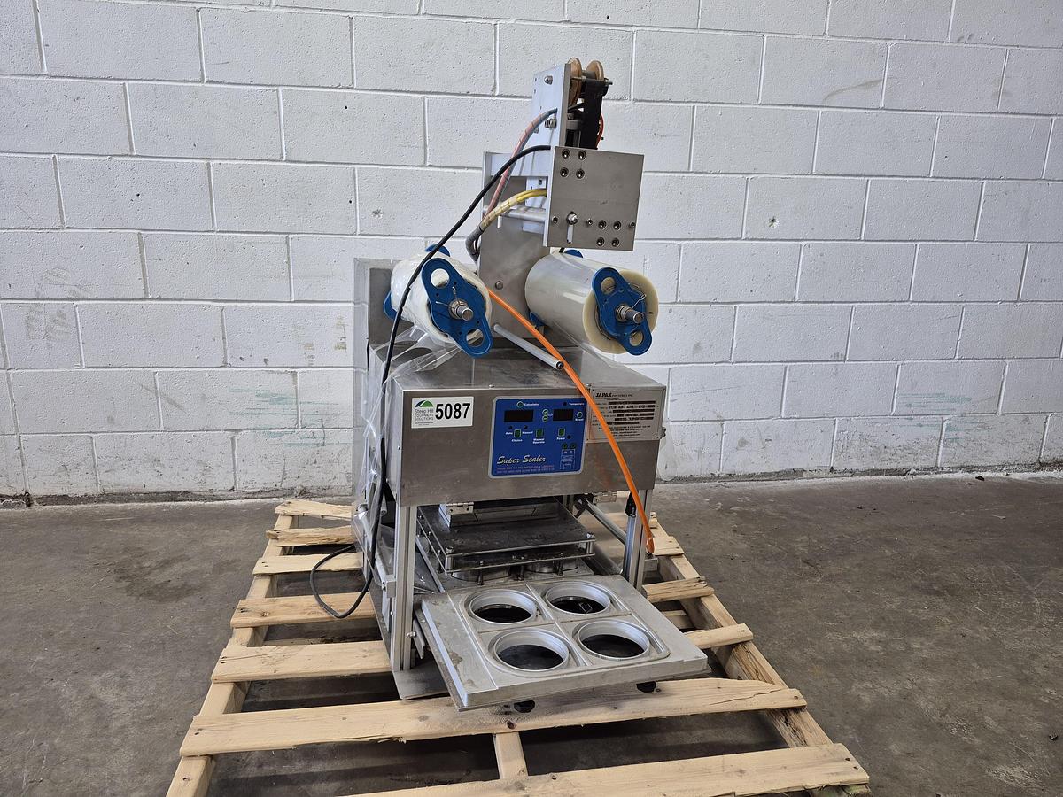 Used Japak KE TO-900 Automatic Cup & Tray Sealer