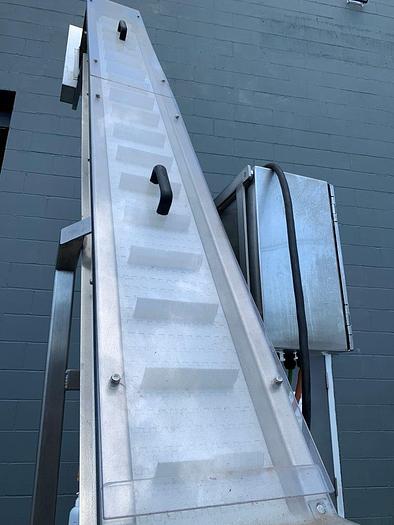 Used FMA 12' High Incline Indexing Conveyor