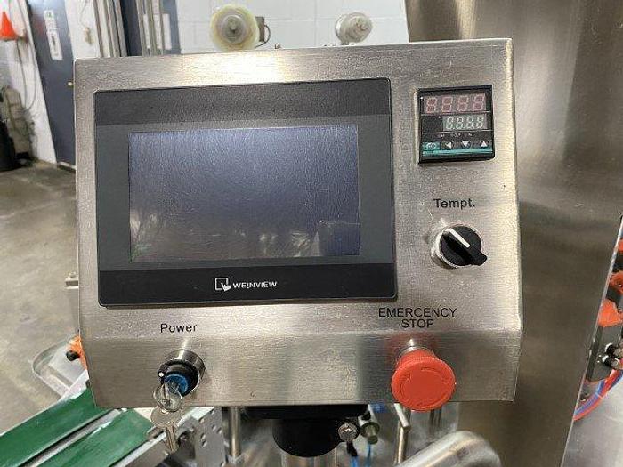 Used Bespacker XBG900-2 Rotary Cup Fill & Seal