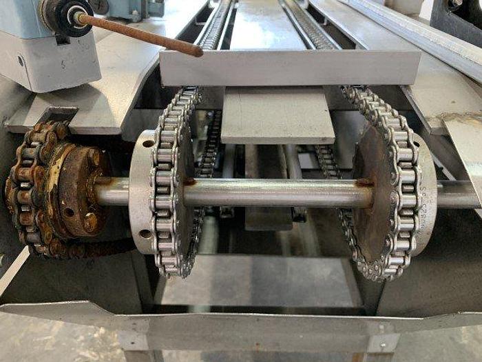 Used Pneumatic Press on Chain Conveyor