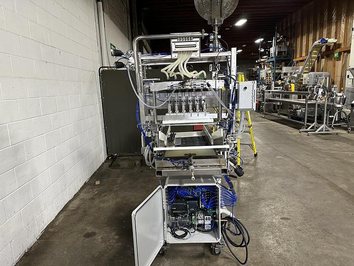 Used CBK 6 Head Bottle Filler