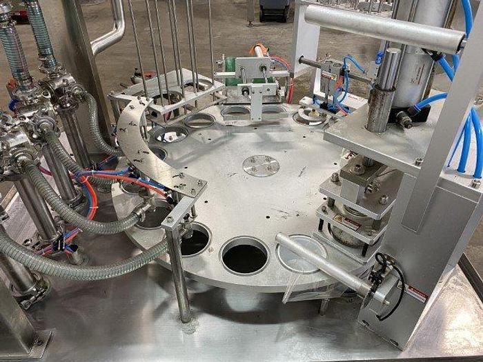 Used Bespacker XBG900-2 Rotary Cup Fill & Seal